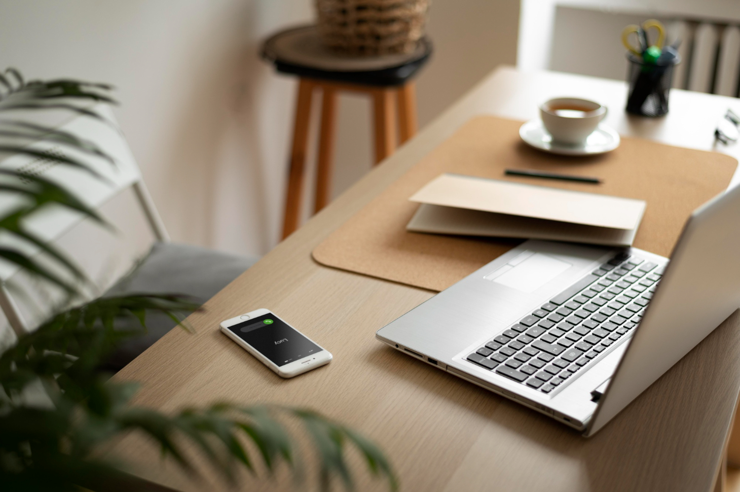 High angle desk arrangement with laptop
